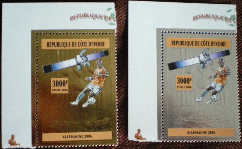 Ivory Coast 2006 World Cup Soccer Gold and Silver Foil Close up View of Year Date Ivory Coast 2006 World Cup Soccer Gold and Silver Foil Close up View of Year Date