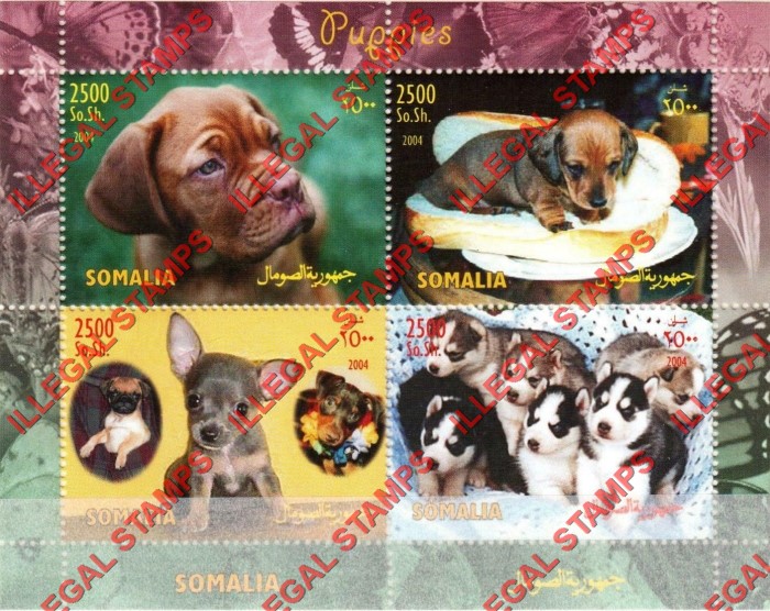 Somalia 2004 Puppies Dogs Illegal Stamp Souvenir Sheet of 4 Somalia 2004 Puppies Dogs Illegal Stamp Souvenir Sheet of 4